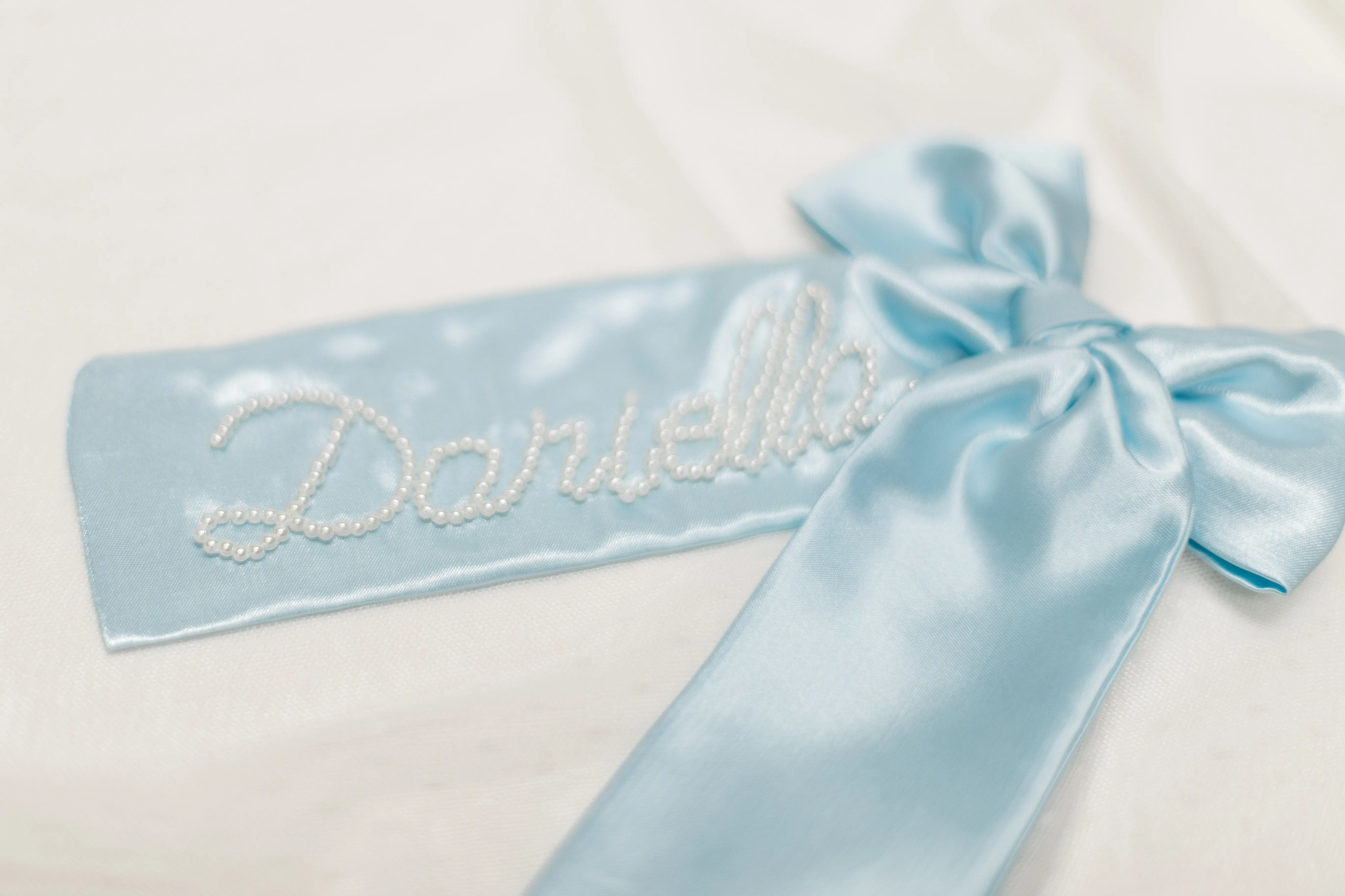 Ocean Blue Long Pearl Bow sold by Buddy Love product image thumbnail 4