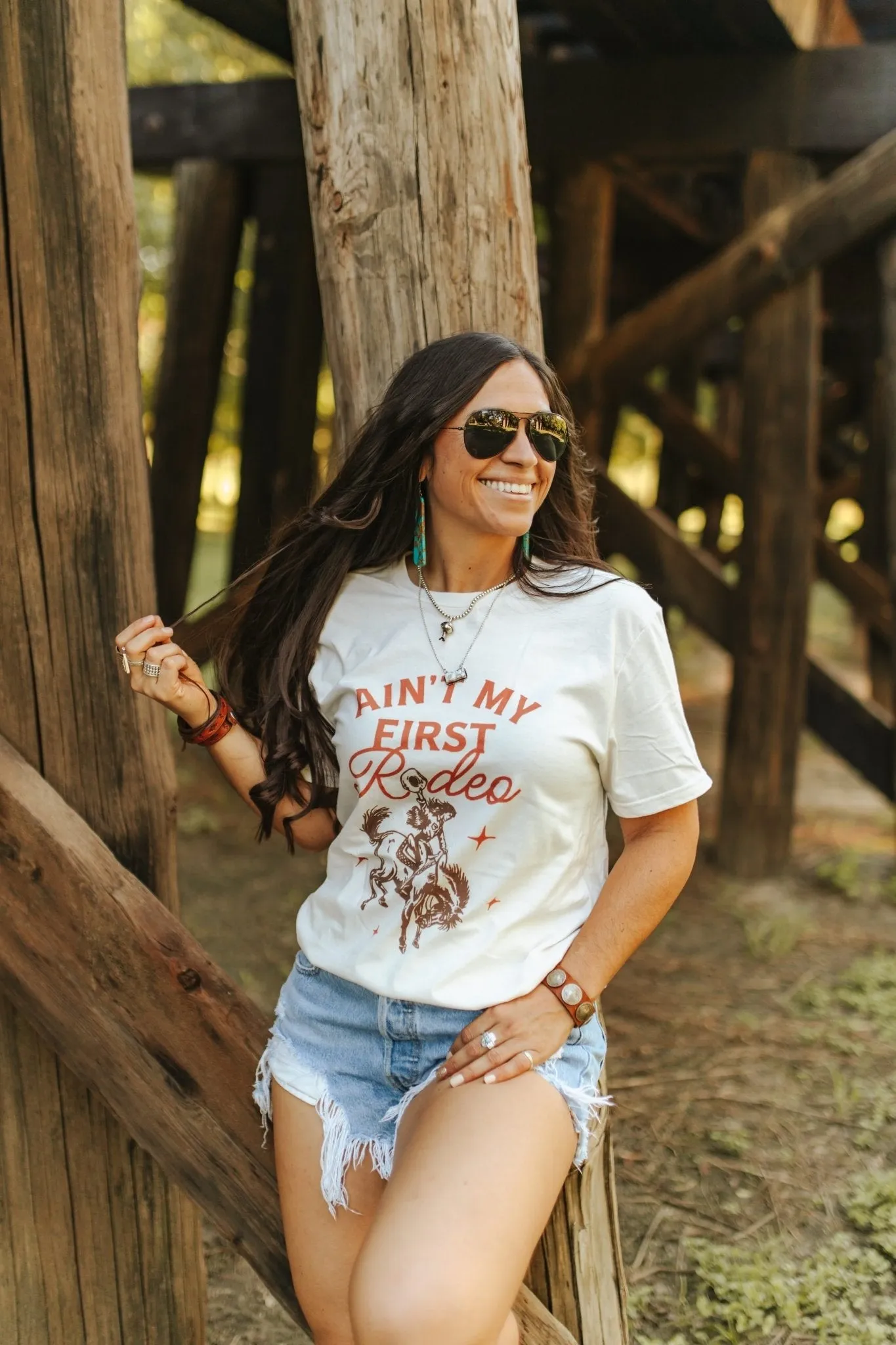 Ain't My First Rodeo Cowgirl Graphic Tee sold by Buddy Love product image thumbnail 2
