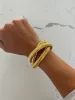 TRIPLE GOLD EMMA BRACELET sold by Buddy Love