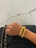 TRIPLE GOLD EMMA BRACELET sold by Buddy Love