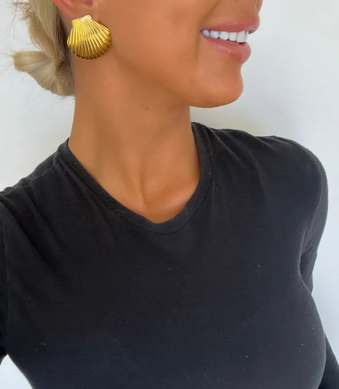 THE SHELL EARRINGS sold by Buddy Love