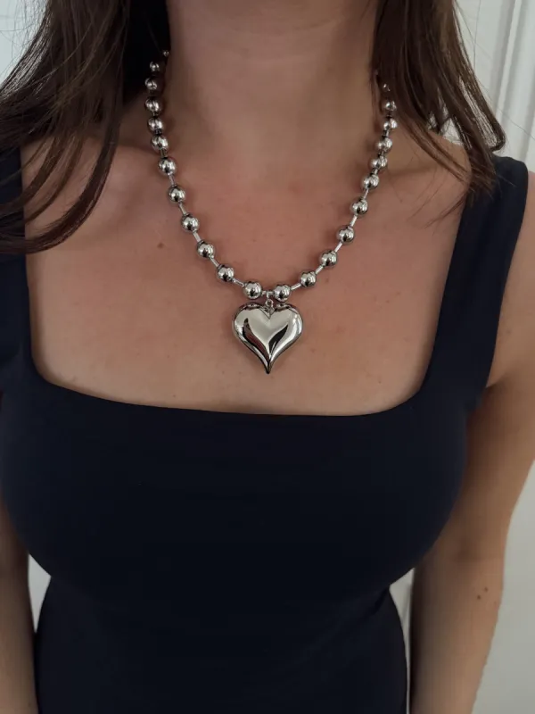 SILVER BUBBLE HEART NECKLACE sold by Buddy Love