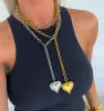 XL WRAP AROUND HEART NECKLACE sold by Buddy Love