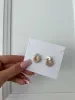 DAINTY PEARL HOOPS sold by Buddy Love