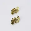 Pinwheel Gold Earring sold by Buddy Love