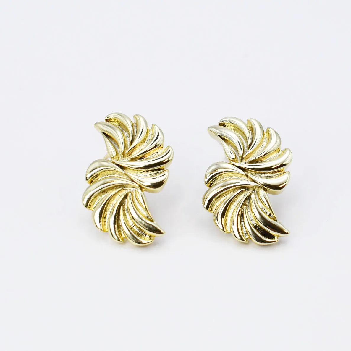 Pinwheel Gold Earring sold by Buddy Love