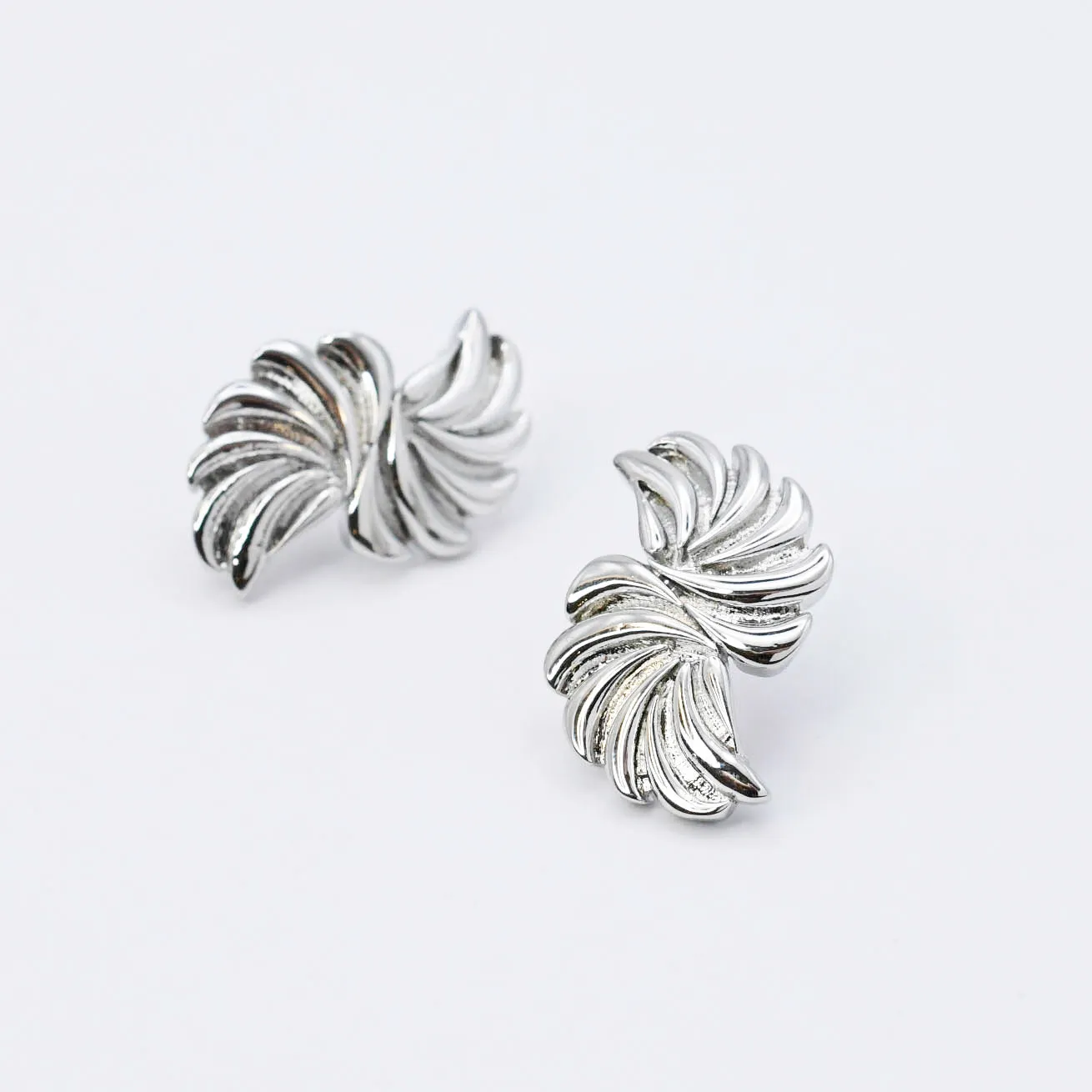Pinwheel Silver Earring sold by Buddy Love