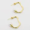 Uneven Pearl Hoop Gold Earring sold by Buddy Love