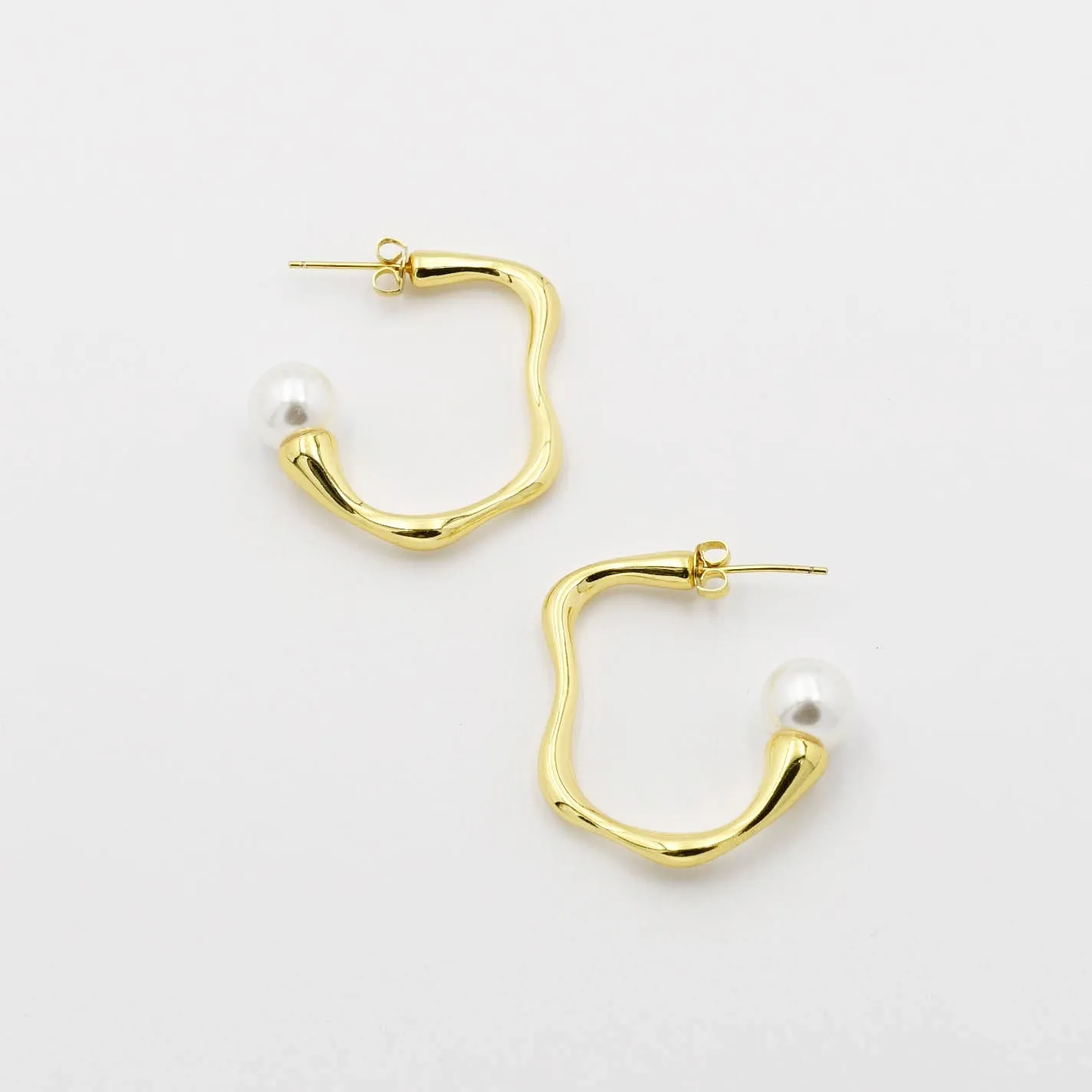 Uneven Pearl Hoop Gold Earring sold by Buddy Love