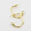 Uneven Pearl Hoop Gold Earring sold by Buddy Love