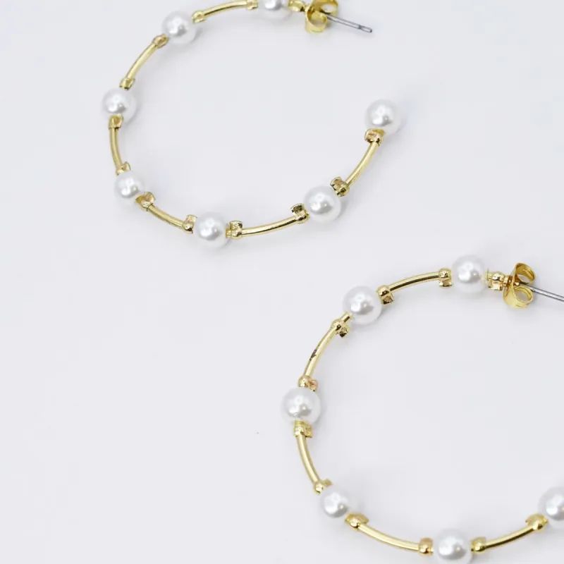 Pearl Girl Hoop Earrings sold by Buddy Love