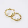 Pearl Embrace Hoop Earrings sold by Buddy Love
