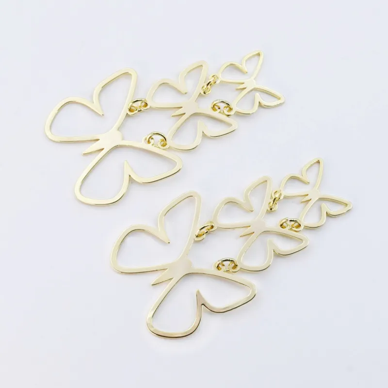 Triple Butterfly Gold Earrings sold by Buddy Love