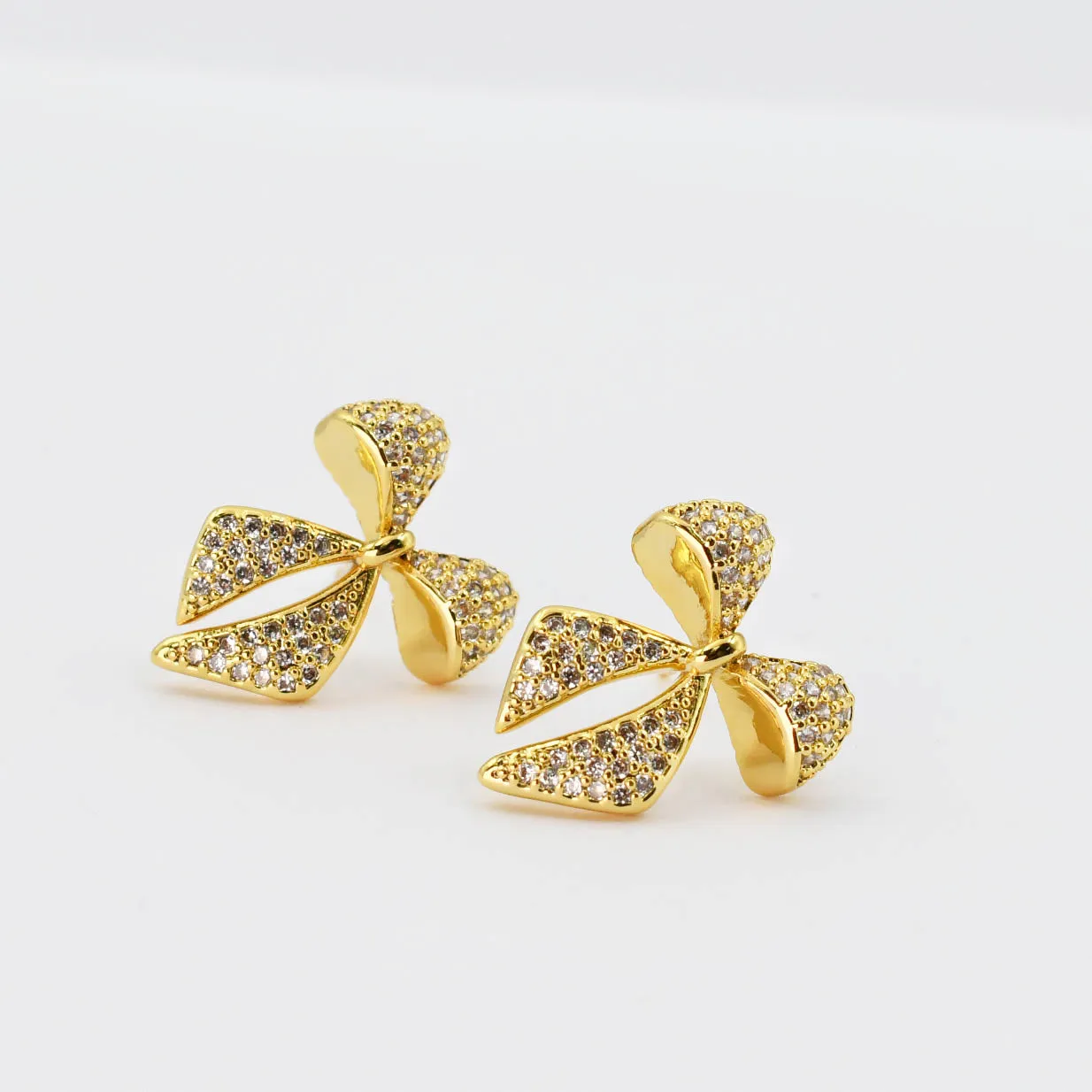 Twinkle Bow Gold Earrings sold by Buddy Love product image thumbnail 2