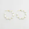 New Pearl Hoop Earrings sold by Buddy Love