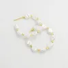 New Pearl Hoop Earrings sold by Buddy Love