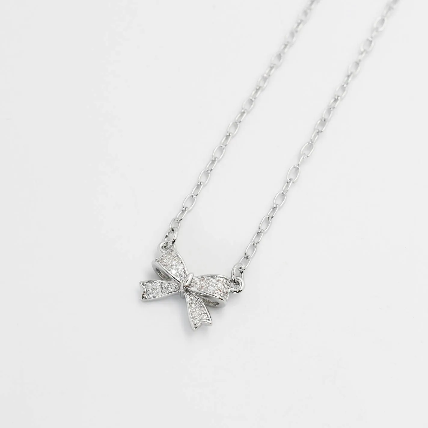 Sweet Bow Silver Necklace sold by Buddy Love product image thumbnail 2