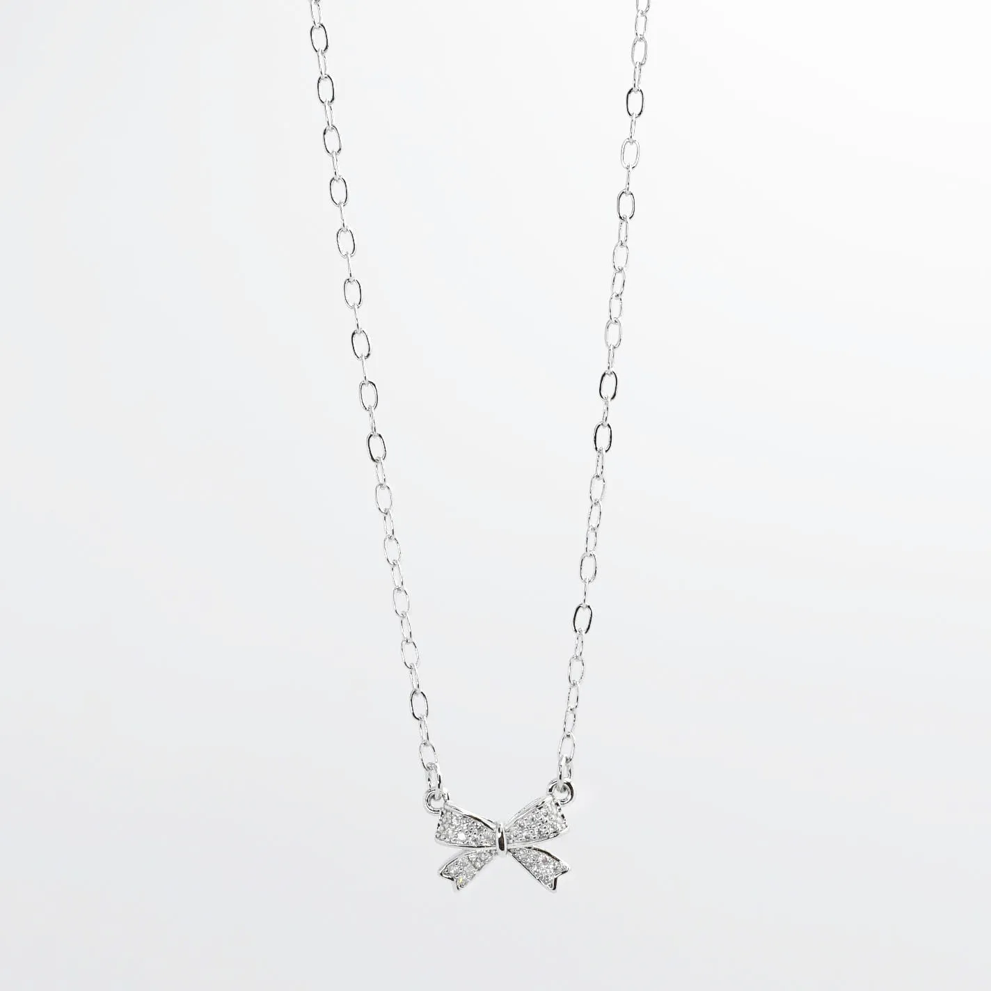 Sweet Bow Silver Necklace sold by Buddy Love