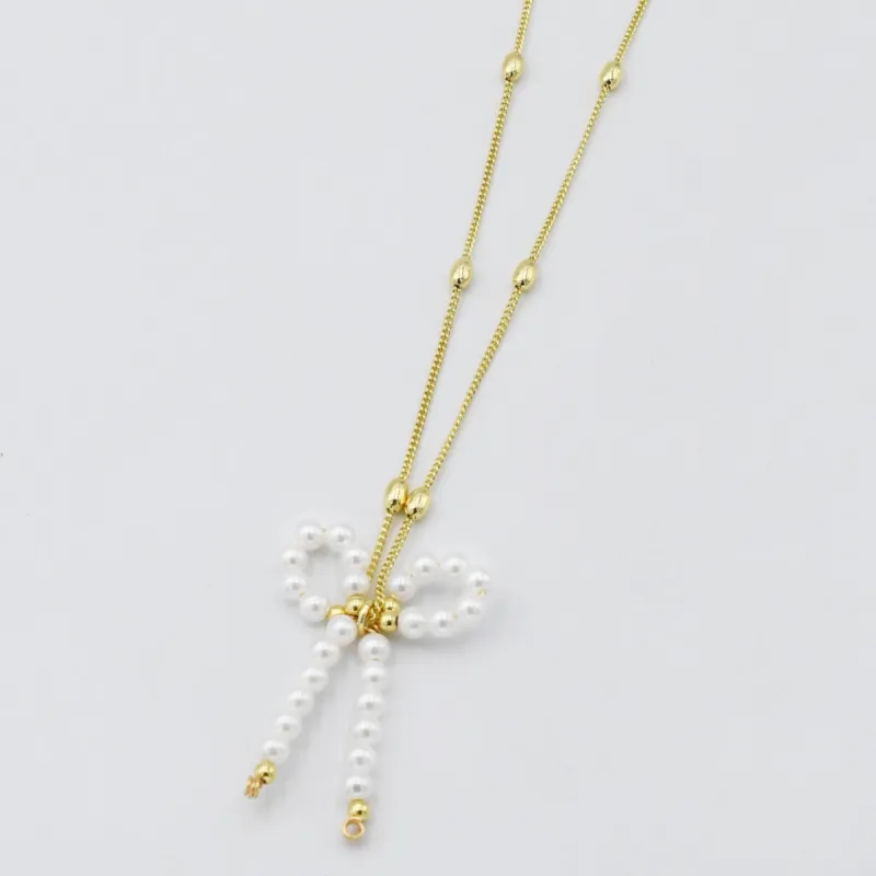Pretty Pearl Bow Necklace sold by Buddy Love