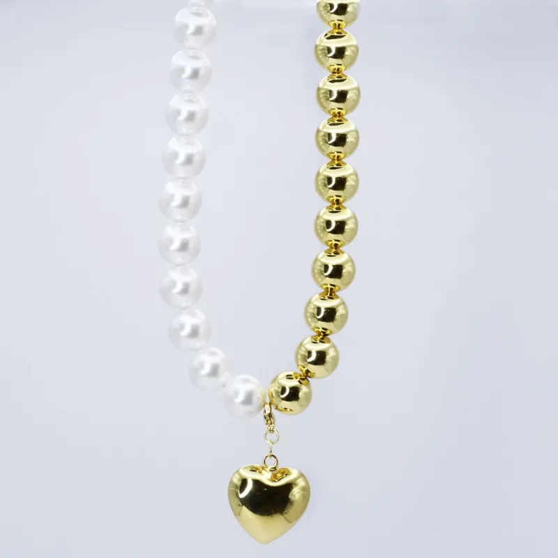 Pearl Whisper Heart Necklace sold by Buddy Love