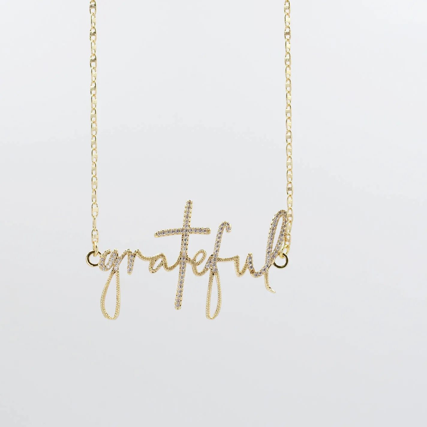 Grateful Necklace Gold sold by Buddy Love