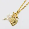 Crystal Heart Cross Charms Necklace sold by Buddy Love