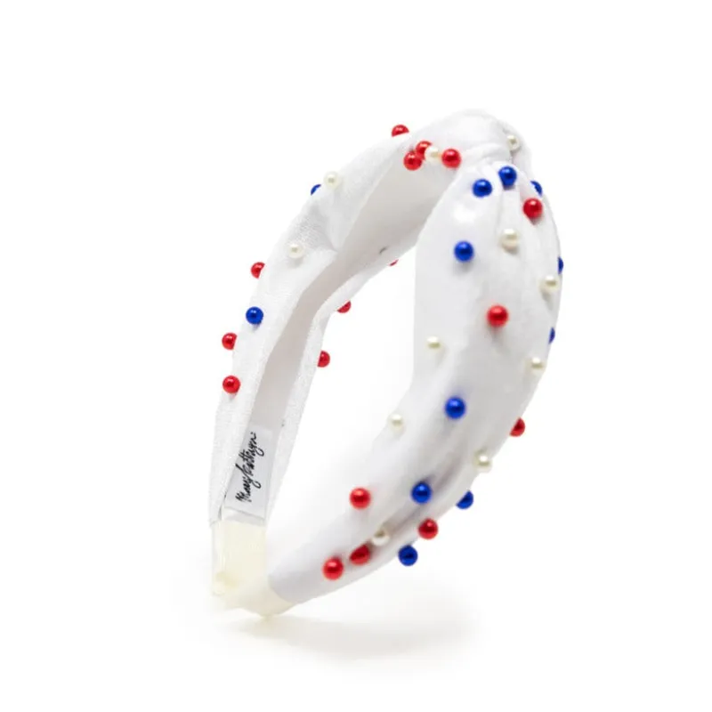 Courtesy of the Red, White, & Blue Headband sold by Buddy Love