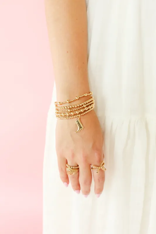 Cowgirl Boot Gold Charm Bracelet sold by Buddy Love
