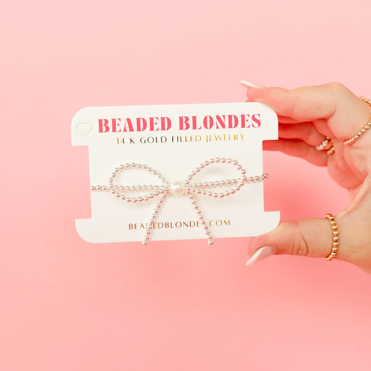 Silver Bow Bracelet sold by Buddy Love