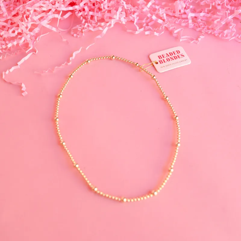 Olive Gold Beaded Stretch Necklace sold by Buddy Love