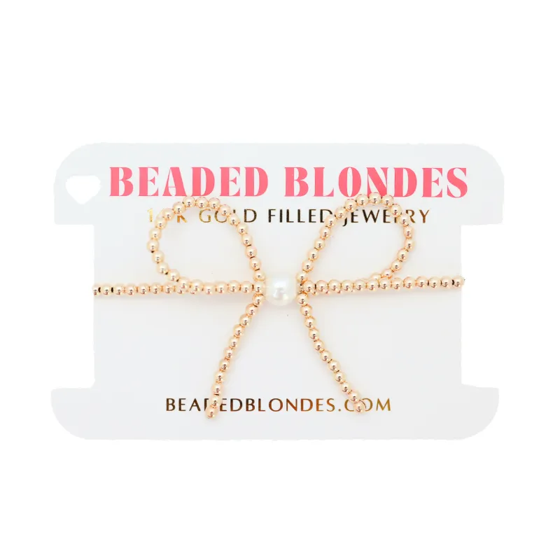 Gold Bow Bracelet sold by Buddy Love