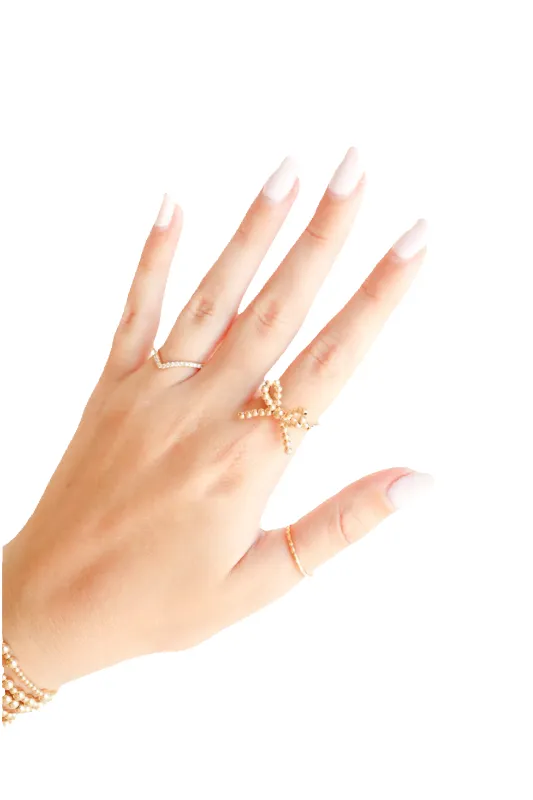 Gold Bow Ring sold by Buddy Love