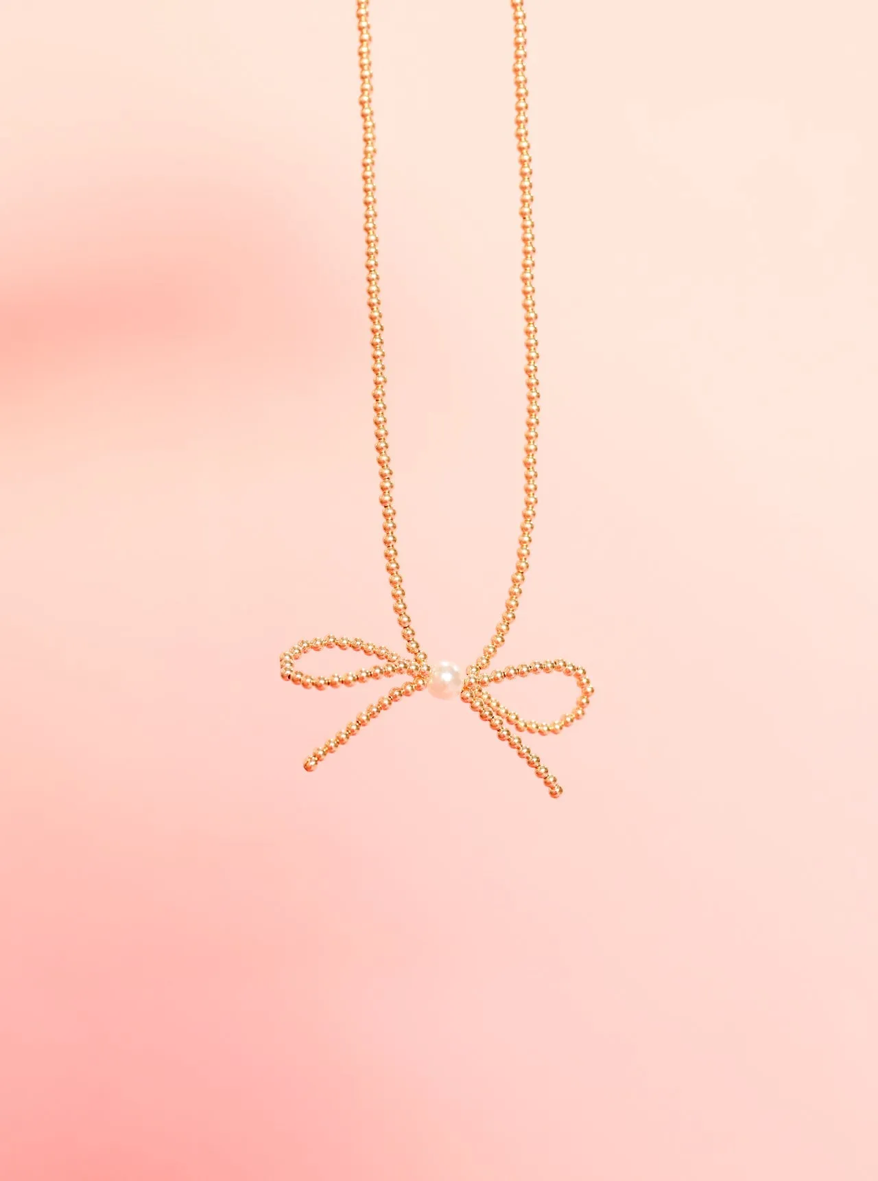 Beaded Bow Necklace sold by Buddy Love product image thumbnail 5