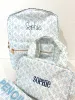 Blue Toile Backpack sold by Buddy Love
