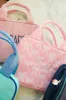 Pink Bow Backpack sold by Buddy Love