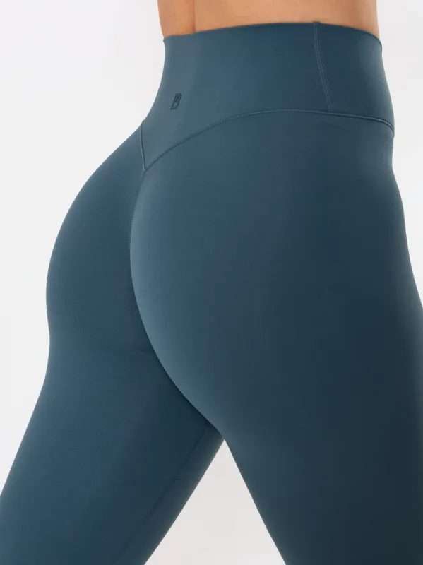 Candid Cross Waist Legging - Enchanted Teal sold by BuffBunny