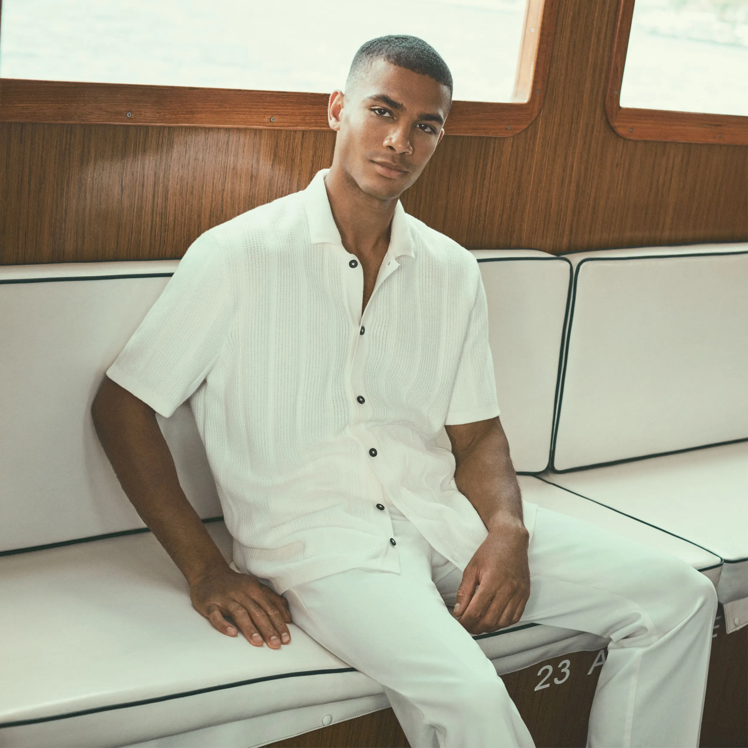 Waffle Rib Full Button Short Sleeve Polo Sweater sold by Bugatchi