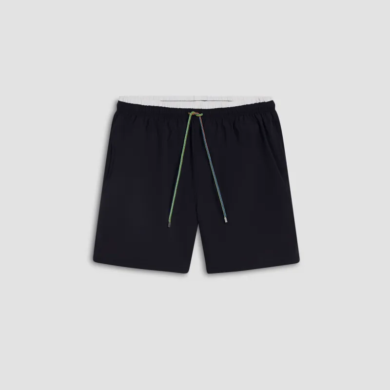Quinn Solid Swim Trunks sold by Bugatchi