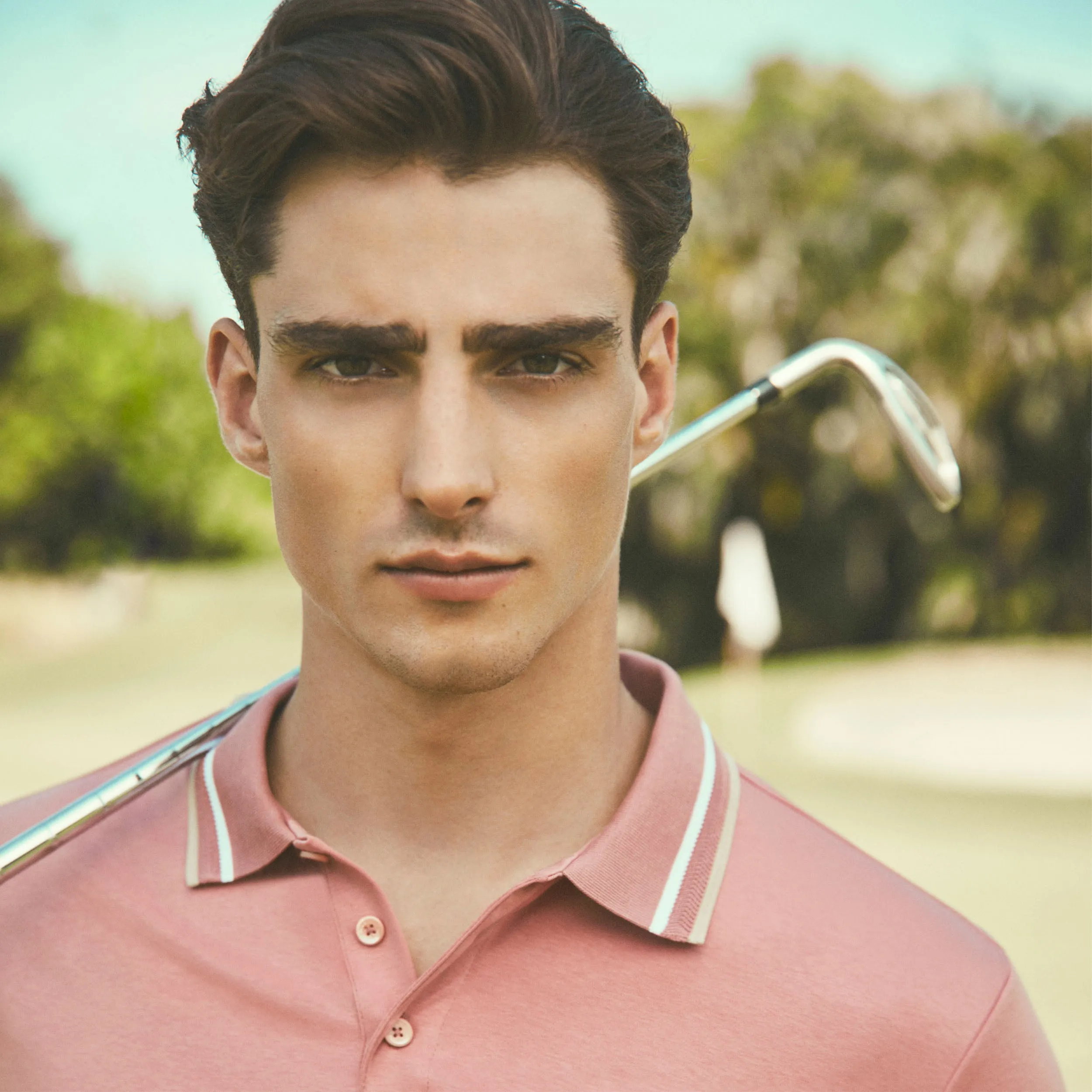 Tipped Solid Polo sold by Bugatchi