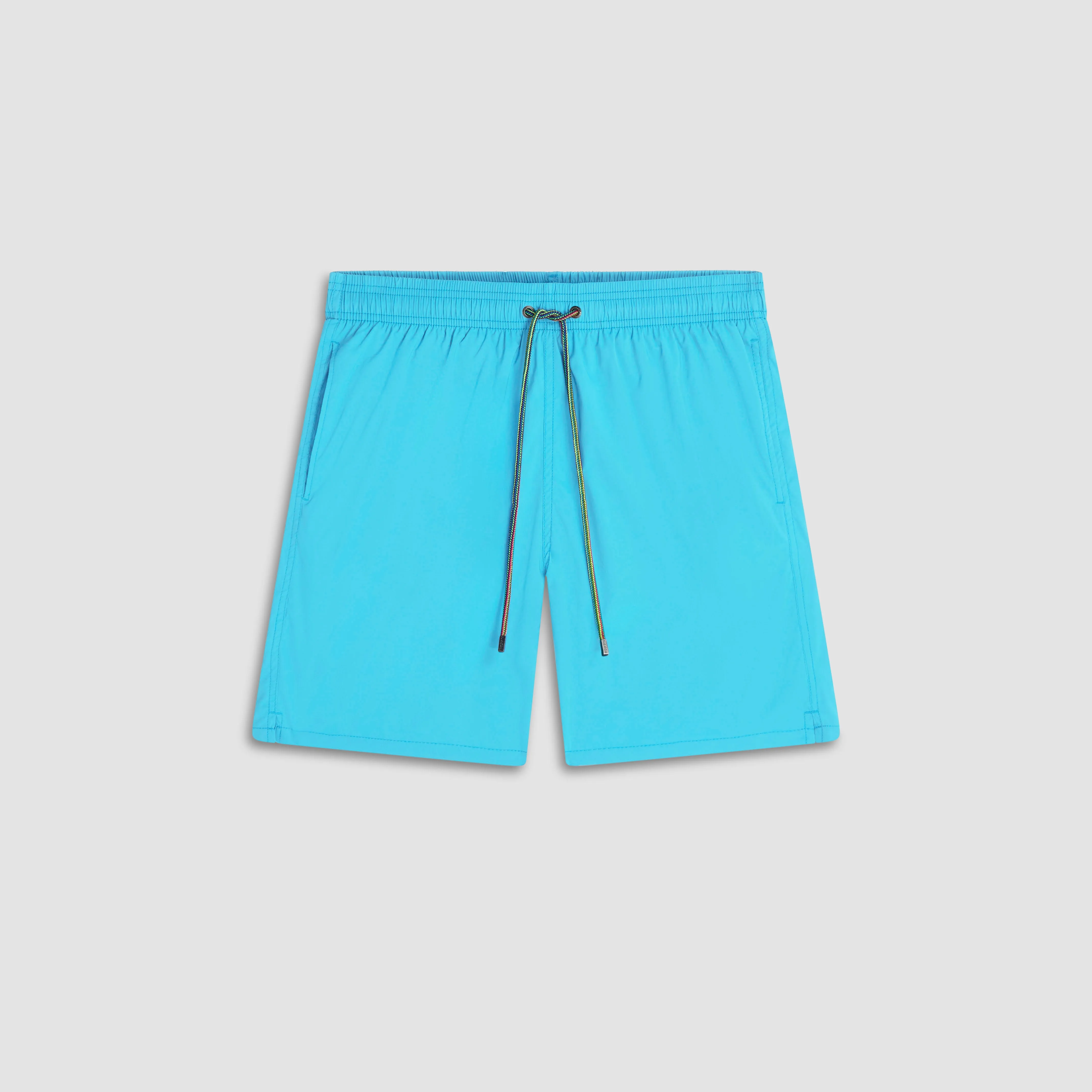 Cosmo Solid Swim Trunks sold by Bugatchi