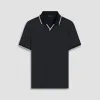 Solid Johnny Collar Polo sold by Bugatchi