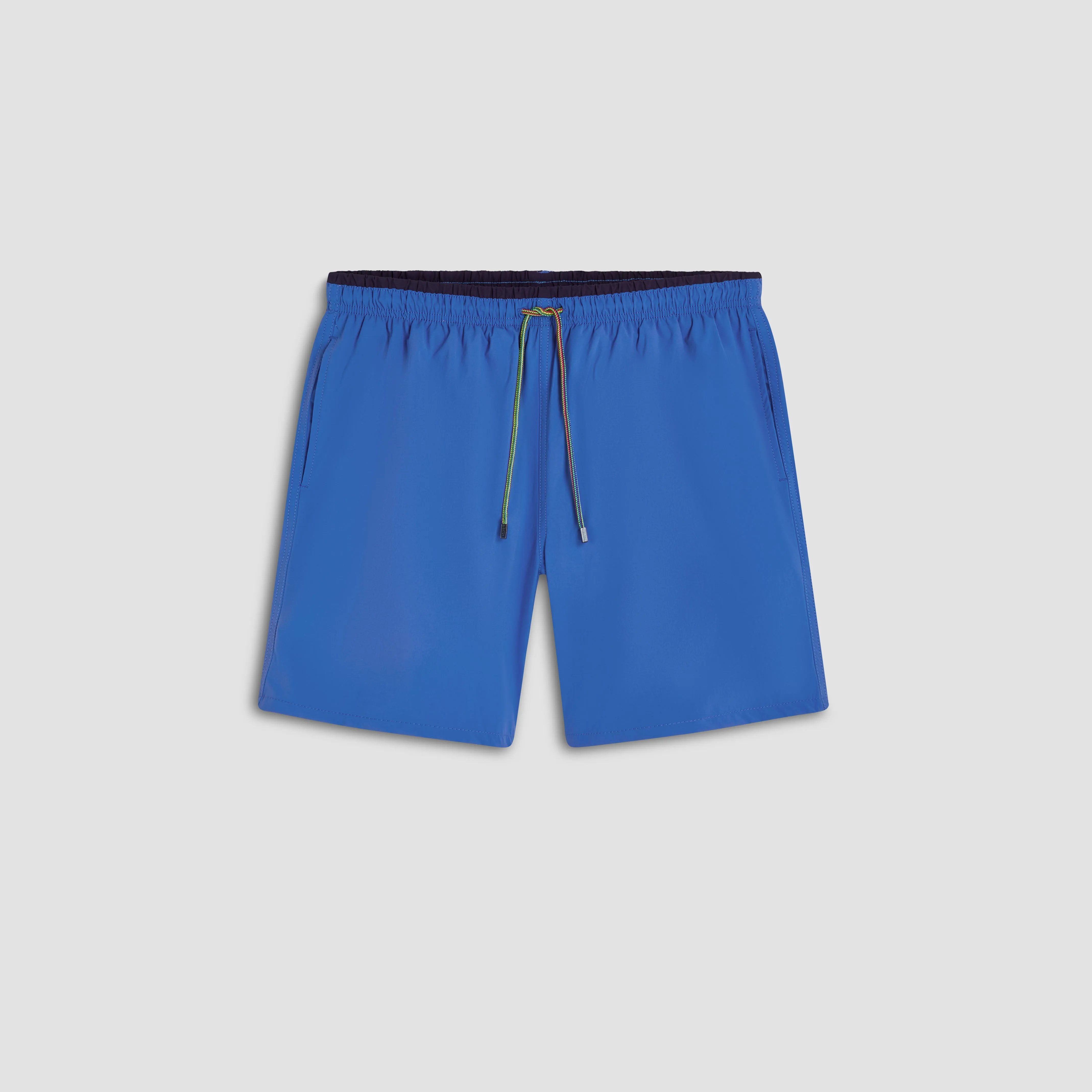 Quinn Solid Swim Trunks sold by Bugatchi