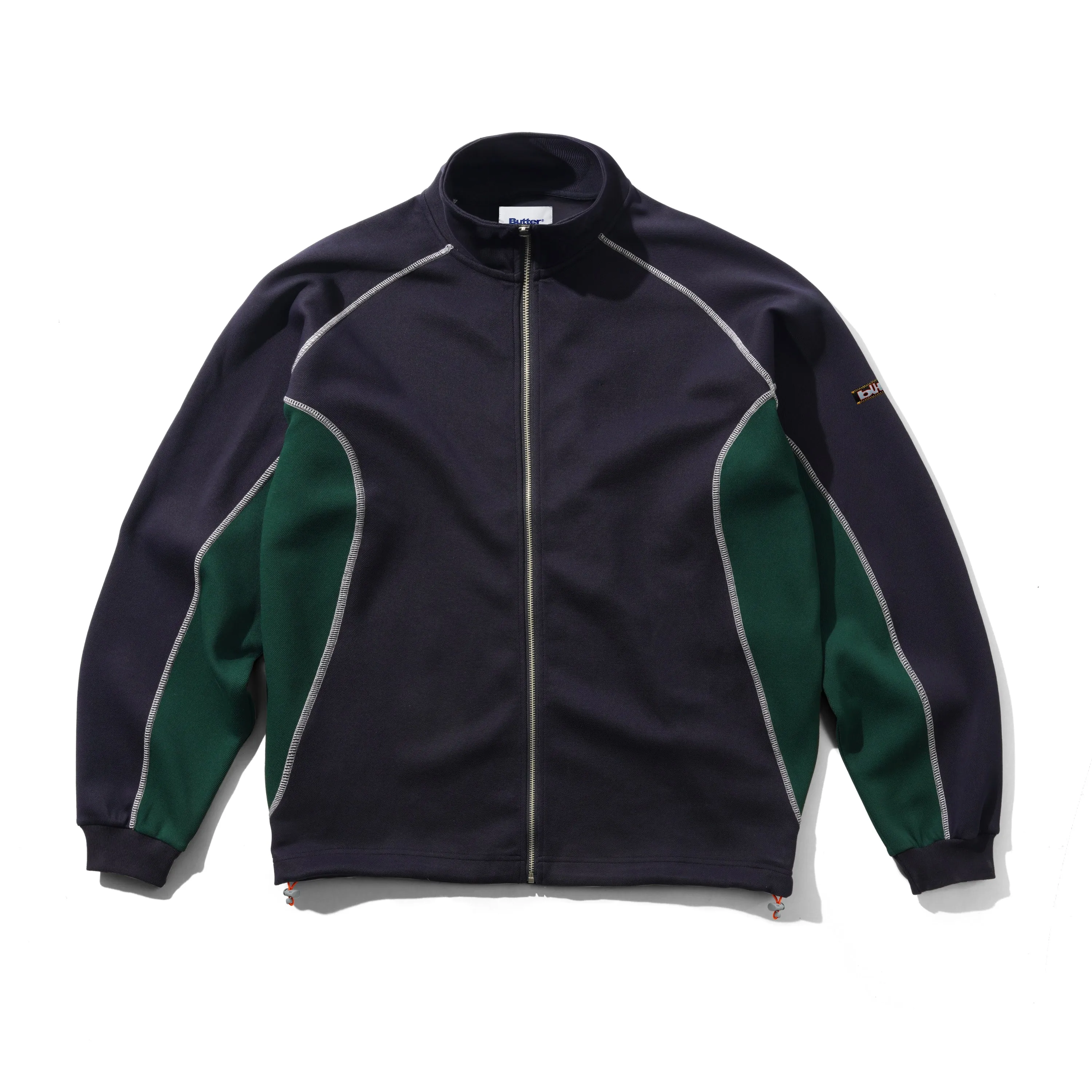 Warped Track Jacket, Navy sold by Butter