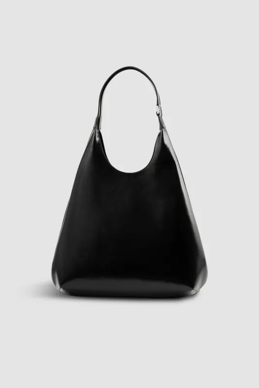 Amber Folio Black Semi Patent Leather Shoulder Bag made by BY FAR