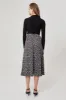 SWAY SKIRT black w cream floral sold by C/MEO Collective