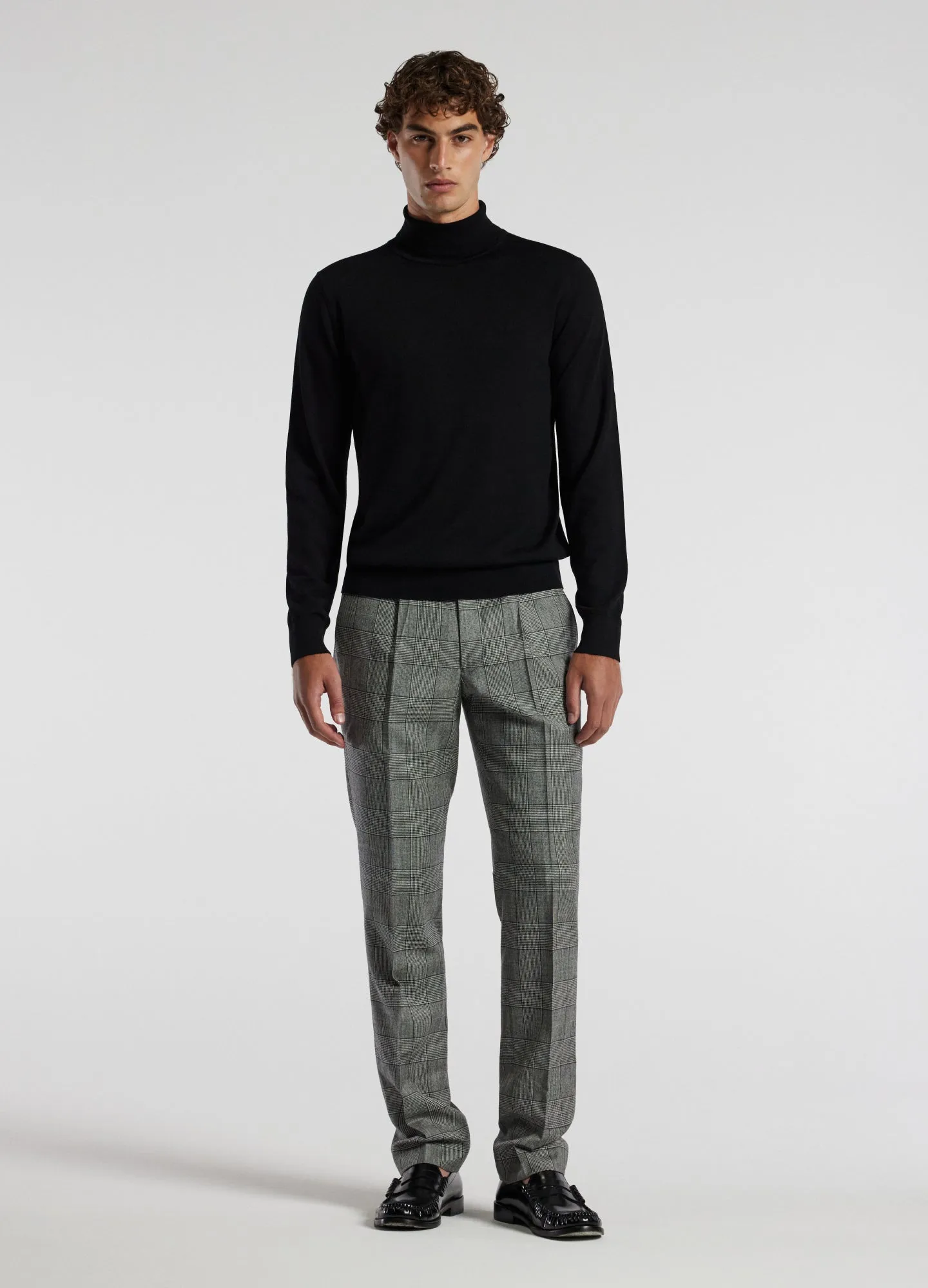 Roll Neck Merino Sweater Black sold by Calibre