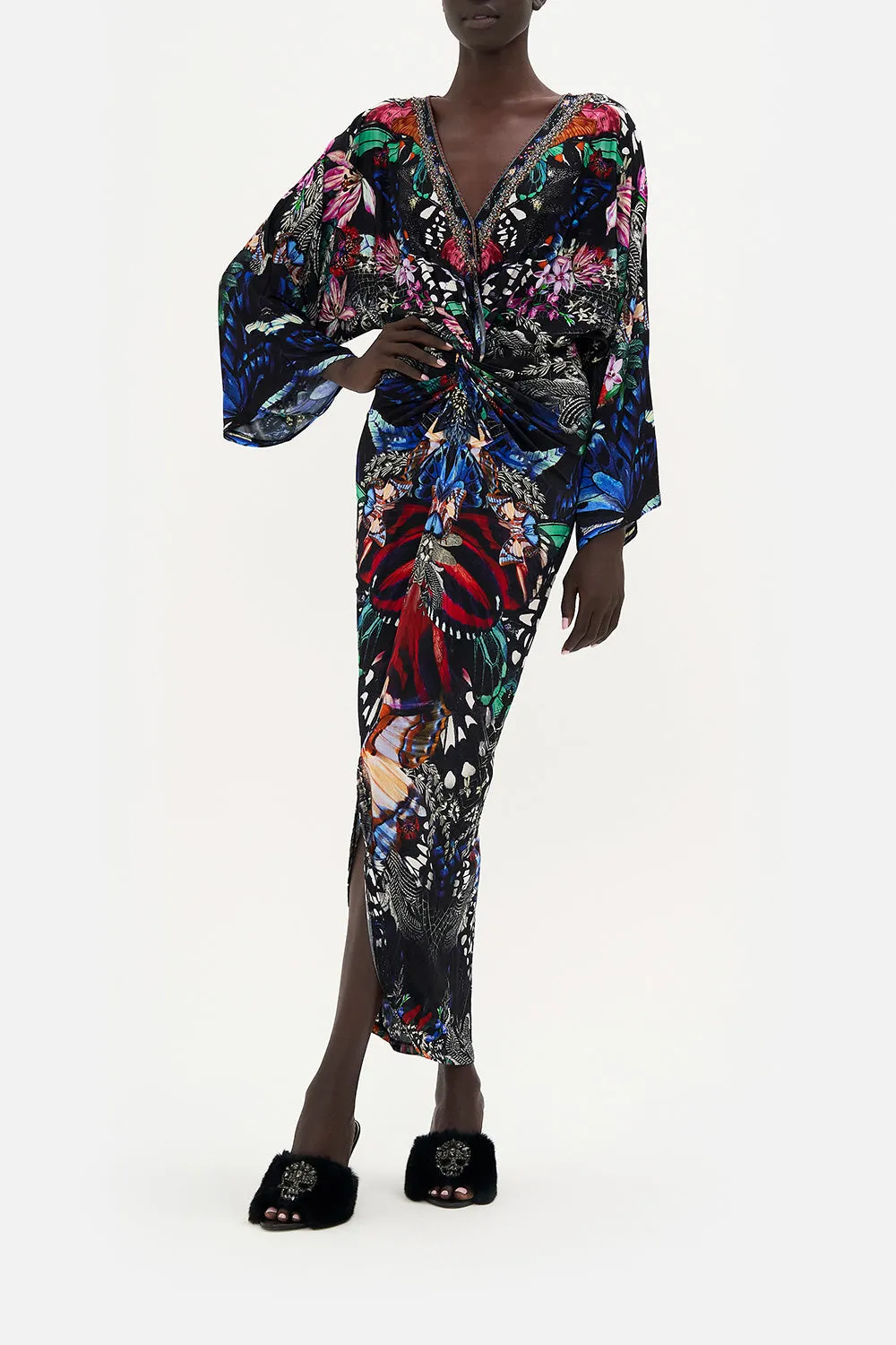 LONG SPLIT FRONT TWIST DRESS FLUTTER BY sold by Camilla