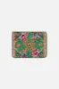 SMALL CANVAS CLUTCH CURIOUS AND CURIOUSER sold by Camilla