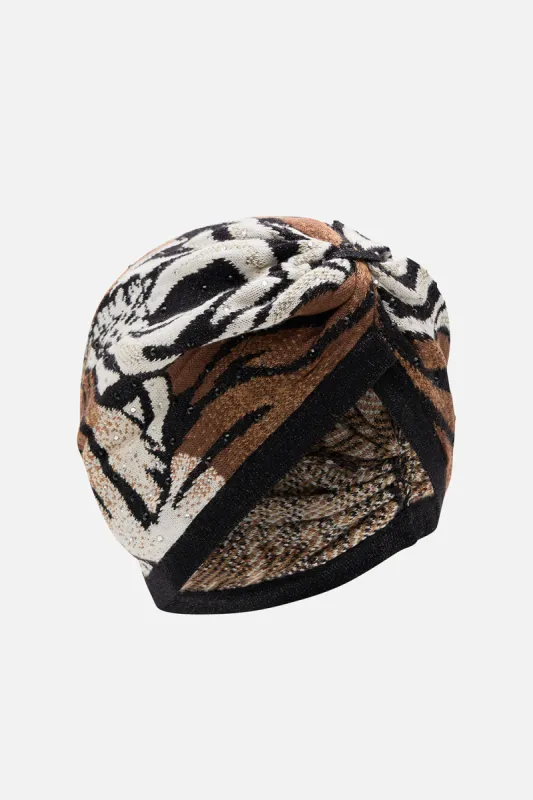 KNOT FRONT TURBAN WHATS NEW PUSSYCAT sold by Camilla