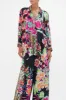 BUTTON UP TOP WITH DRAPED BACK PRINTED PRIMA VERA sold by Camilla